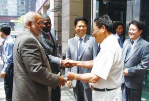 President Donald Ramotar meeting with Chairman of Bai Shan Lin, Chu Wenze, in China.