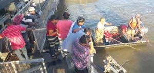 Relatives of the woman gathered at the bridge 