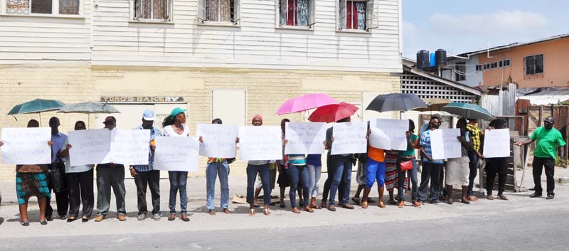 Region Three residents who mounted protest outside KN’s office yesterday.