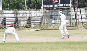 Gavin Boodwah rides a short ball from Chris Barnwell at Bourda yesterday. [Sean Devers photo)