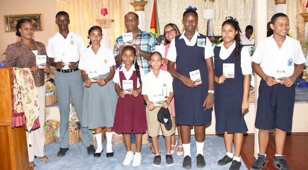 http://www.kaieteurnewsonline.com/images/2016/09/Jennifer-Cipriani-of-Scotia-Bank-Poses-with-Rose-Hall-Town-Council-Officials-and-Students-with-copies-of-the-Booklet..jpg