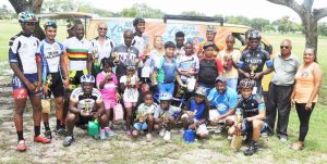 Sponsors representatives, competitors and officials pose for a photo following yesterday presentation at the National Park.