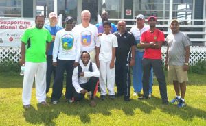 Shivnarine Chanderpaul [3rd left) along with officials and participants in the cricket coaches programme in Florida. 