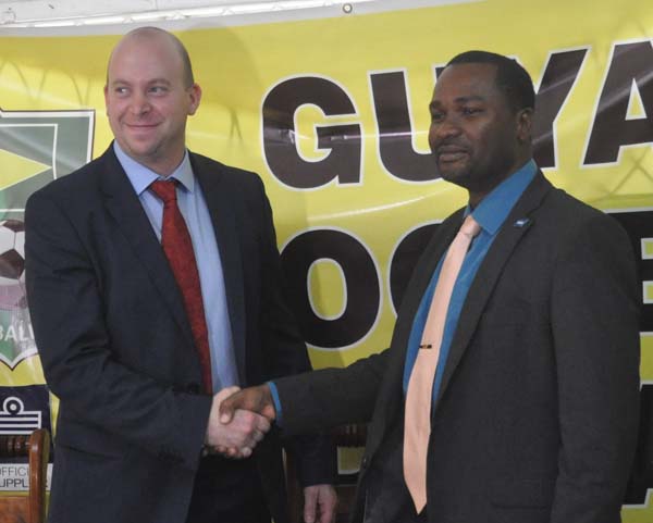 http://www.kaieteurnewsonline.com/images/2016/10/New-TD-Ian-Greenwood-is-welcomed-by-GFF-President-Wayne-Ford-at-a-Media-briefing-yesterday..jpg