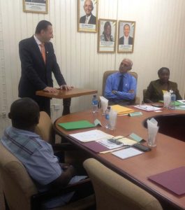 Minister of Communities, Ronald Bulkan [second from right), and Minister responsible for Housing, Valerie Patterson (far right), listen as Director of Country Programs Department and Special Advisor to the Vice-President, Mohammad Alsaati explains the collaboration between Guyana and the Islamic Development Bank.