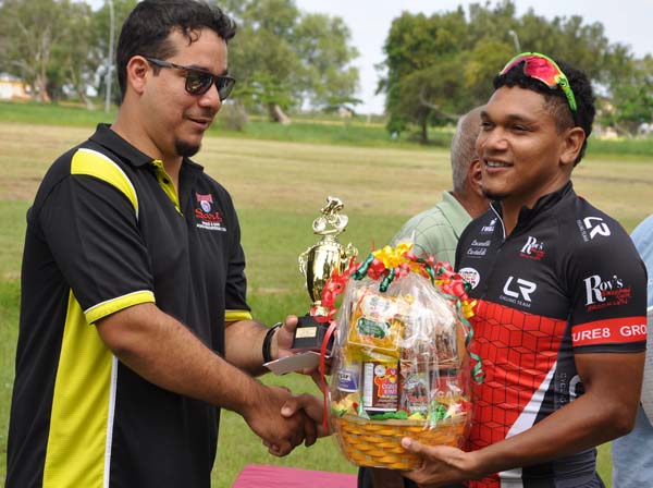 http://www.kaieteurnewsonline.com/images/2017/01/Regan-Rodrigues-Jnr.-left-hands-over-the-feature-race-winning-hamper-and-trophy-to-Alanzo-Greaves..jpg