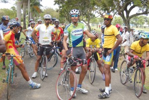  SOLIDARITY!!! Cyclists at the starting line for the feature race refusing to  move off even after being given instructions to do so. The rider at the centre  of the incident, Jude Bentley is at centre. (Franklin Wilson photo)  