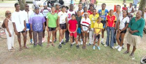 Recipients of prizes pose with the sponsors after yesterday’s  George Cumberbatch Memorial race meet at the National Park.   