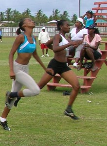 Nerissa Alleyne (second, right) pips Nadine Rodrigues on the finish line.