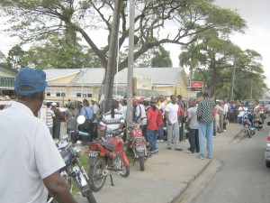 Some of the people who were waiting outside  of the Licence Office yesterday morning. 