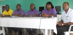  Members of the APGI, former policemen (from right) Ralph Green, Bonita Wolfe-Woodhouse, Clinton Blair, Errol Lewis and their local counterpart Lucius Prescott.  