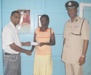 From left: Imran Hamid, Doreen Glasgow, and Commander Vyphuis.