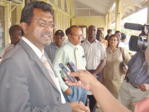 AFC Chairman Khemraj Ramjattan speaking to  media operatives as party supporters look on