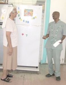 Sister Beatrice Fernandes and  Mayor of Georgetown Hamilton Green