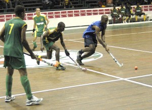 GCC ‘A’ Kevin Spencer (right) dribbles past Hikers Jerazeno Bell during their encounter last Friday.