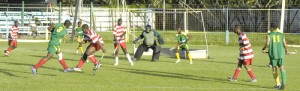 Hikers Shane Samuels (#3) delivers a powerful shot to  goal during their encounter against Old Fort last Friday.