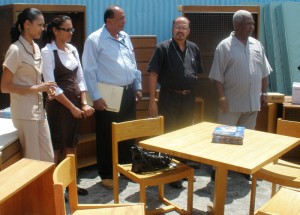 From right: Mr Leon Davis, Dr Bheri Ramsarran  and others amongst the donated items