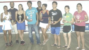 Prize winners show off their trophies for Kaieteur Sport last Saturday, at Georgetown Club Courts.