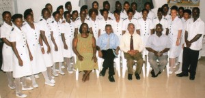 Posing with the graduates are, from right, sitting - Council Member Dr. Clive Bowman, The Chairman Mr. Vibert Parvatan, Minister of Health, Dr. Leslie Ramsammy and Council Member, Dr. Holly Alexander and Graduates.