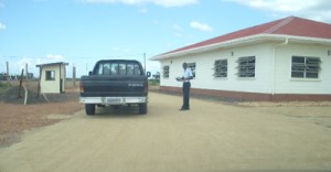 A local policeman carries out checks on a vehicle arriving from Brazil.