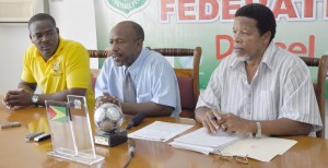  GFF President Colin Klass (Centre) briefing the media yesterday at the Federation headquarters. At right is General Secretary Noel Adonis and left, Vice President Franklin Wilson. 