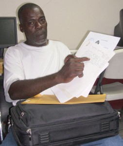 Promoter, Mark Smith displays the letters allegedly written and stamped by the NDC Chairman yesterday