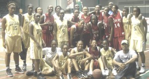 The South Carolina Lady All-Stars and the Guyana national women’s team take a group photograph at the Cliff Anderson Sports Hall after wrapping up their official goodwill visit.