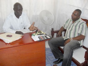 Dismissed Superintendent of Police Simon McBean, right, discusses his options with attorney at law Patrice Henry. 