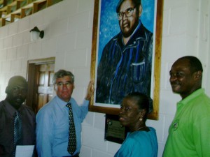 EU Ambassador Geert Heikens and Eileen Benjamin unveil a plaque on the  occasion of the launching of the Conference Centre