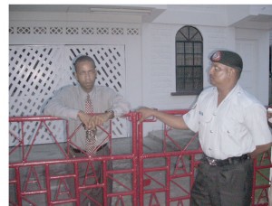  Benschop stands at his gate in defiance of the police