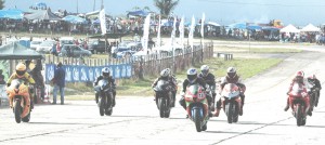 Flashback: Canadian Kevin Graham (extreme left) leads Stephen Vieira (#46) as they approach the first turn at the South Dakota Circuit. 