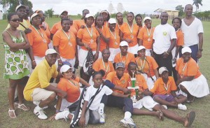 The victorious MCYS team pose with the winning trophy and medals following their victory over PYARG last Sunday.