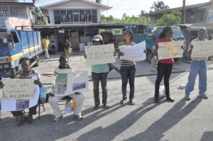 Members of Red Thread demonstrating outside the Leonora Police Station yesterday