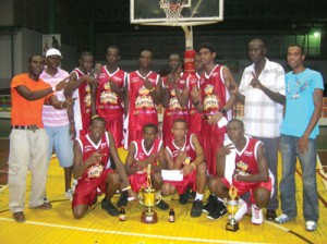 WE DID IT!!! Linden's junior All-Stars along with officials pose for a photo opportunity  after winning their second consecutive title against Georgetown Sunday night.