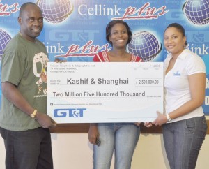 GT&T’s Marketing Officer Abena Fung (right) hands over cheque to Aubrey Major (left), in the presence of Rhonda Johnson, Senior Marketing Officer. 