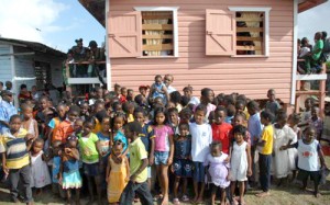 President Jagdeo with the children of Sophia, to whom he delivered Christmas presents (OP Photo, Sandra Prince)