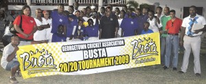 The victorious Malteenoes team pose with GCA officials and Busta Country Manager  Robert Selman (black jersey) shortly after collecting the winning trophy yesterday, at DCC ground.