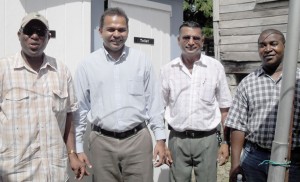 Minister of Culture Youth and Sports, Frank Anthony, Director of Sports,  Neil Kumar, GABA President, Steve Ninvalle and GABA Secretary, Seon Richmond stand before the renovated toilet, bath and dressing room moments after the gym was the commissioned  