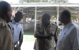     From right: Minister of Home Affairs Clement Rohee, Police Commissioner Henry Greene and Chief-of-Staff Gary Best during a discussion at the Police Officers’ Annual Conference last Thursday.            