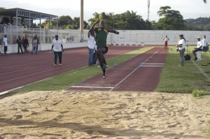 Winston Caesar prepares for takeoff in the triple jump event yesterday at the Baduel Stadium.