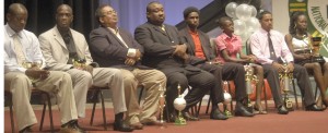 From left, Franklin Wilson, Rawle Toney, Peter Green, Hilbert Foster, Claudius Butts,  Jevina Straker, Geron Williams and Alika Morgan shortly after collecting their awards.