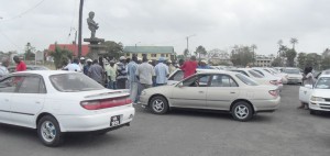 The taxi drivers congregate to protest the issue of the new colour code 