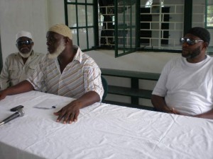 Imam Shaheed Uthman of the Guyana Muslim Mission, Mandela Masjid (center) with other officials at the press conference yesterday.