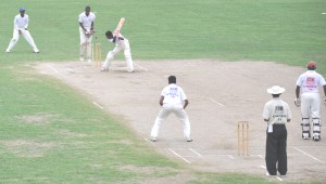 Man-of-the-Series in both GTM Three-Day and One-Day U-19 tournaments Harrinarine Chattergoon is bowled by left-arm spinner Raj Nanan for a top score of 39 yesterday. Demerara Skipper Dexter Solomon is elated. 