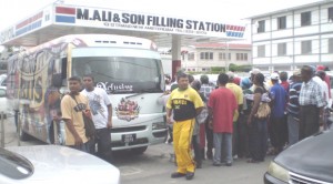 New Amsterdam residents throng the ‘Bring It’ bus on Saturday during the ICC World 20/20 promotion in that town.