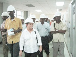 Adviser to the President Gail Teixeira (centre) flanked by  Members of the Parliamentary Sectoral Committee on  Economics during Wednesday’s visit to the Skeldon factory 