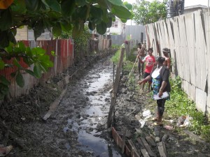  Residents assist the clearing of the drains.