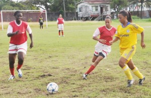 Part of the action in the Women’s Inter-Association Football Competition between host Georgetown and Region Nine, at the GFC ground yesterday.   