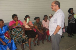 Minister within the Ministry of Health, Dr. Bheri Ramsaran interacting with patients at the National Ophthalmology Hospital Port Mourant.