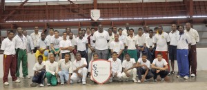 The participants with GCA officials and the sponsor at yesterday’s cricket clinic at the National gymnasium. 